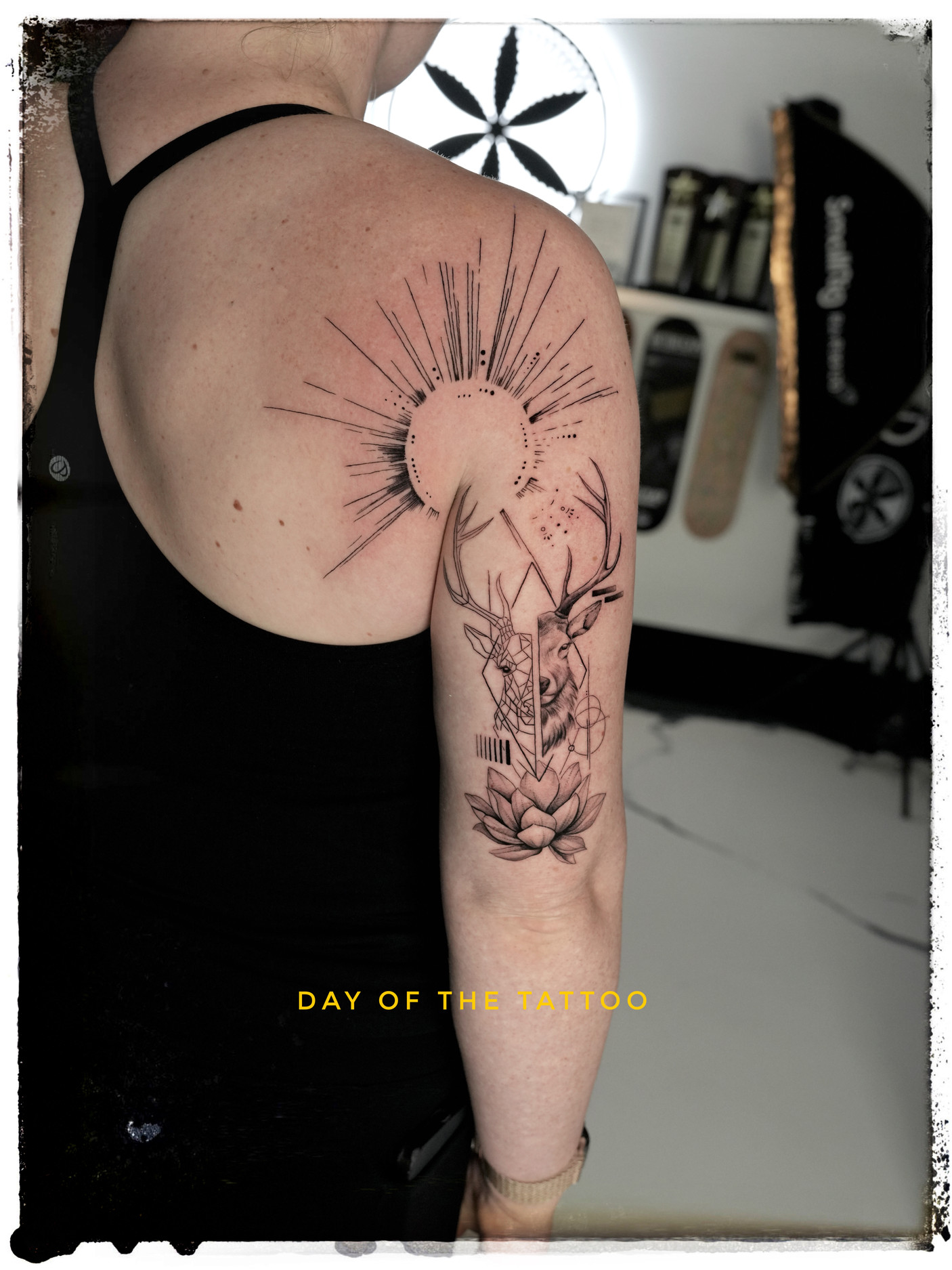 Deer, sunburst and lotus fine line tattoo the day it was made